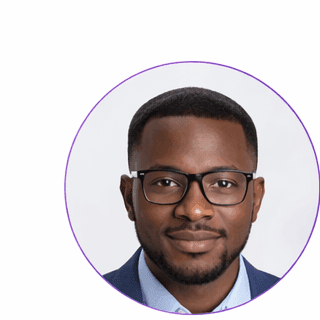 Professional portrait of Tomi Adebayo, Event Director